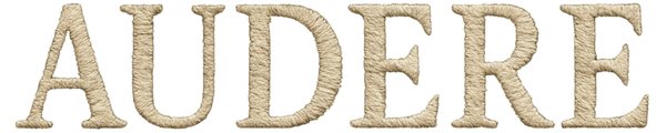 Text 'AUDERE' made of beige fabric letters on a white background